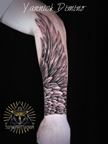 tatouage-aile-realiste-bras